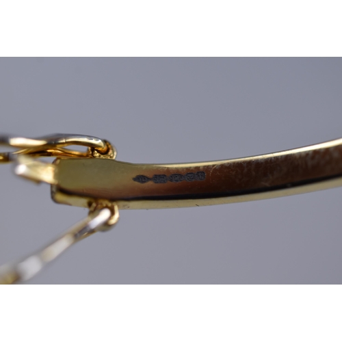 40 - Hallmarked Silver Infinity Bangle with Safety Catch marked with Anouska Georgia London Complete with... 