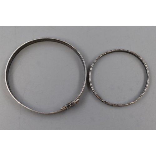 42 - Two Small Marked Silver Bangles