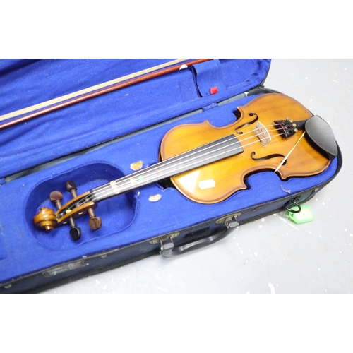 507 - Cased Childs Violin complete with Bow and Bow String Wax