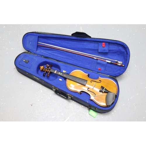 507 - Cased Childs Violin complete with Bow and Bow String Wax