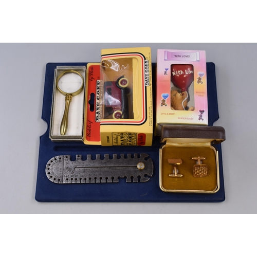 70 - Small Lot of Tray Items to Include Cufflinks, Leonardo Collection Teddy Figurine, Diecast Models of ... 