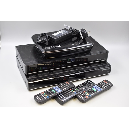 517 - Two Panasonic Freeview Boxes and Humax Freesat Box All Have Remotes (All Power On)