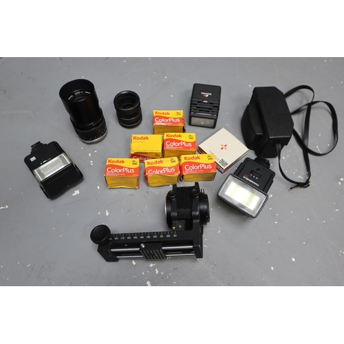 520 - Mixed Lot of Camera Equipment to include Flashes, Films, Kodak 155 X Instamatic Camera and more