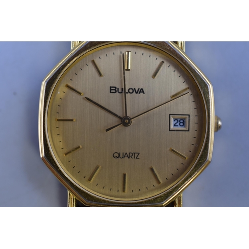 90 - A Bulova Gold Tone Quartz Day/Time Watch, Working