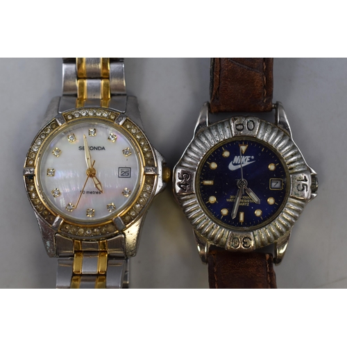 96 - Three Quartz Watches including Nike, Sekonda, and Fossil