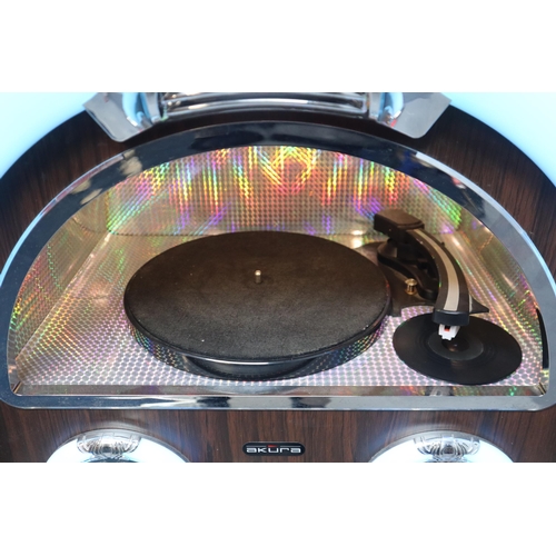 437 - An Akura Jukebox Music Centre (FM Radio, Record Player, CD Player, Aux). Powers On and Lights Up Whe... 