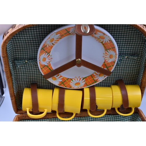 811 - Rattan Picnic Basket containing Mugs, Plates, Cutlery and Storage Containers