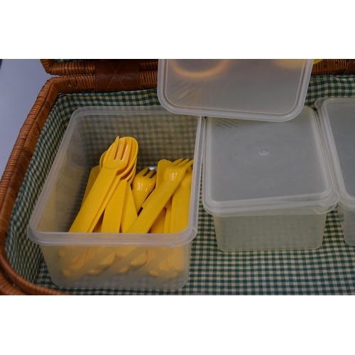 811 - Rattan Picnic Basket containing Mugs, Plates, Cutlery and Storage Containers