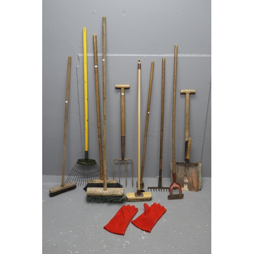 663 - A Selection of Eleven Gardening Tools With A Pair of Gardening Gloves. Includes Shovels, Rakes, Dutc... 