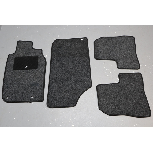 710 - Four Car Mats for a Peugeot