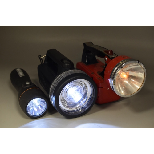 701 - Three Hand Held Torches to include a working Vintage Ever Ready Space Beam, and Two working Modern L... 