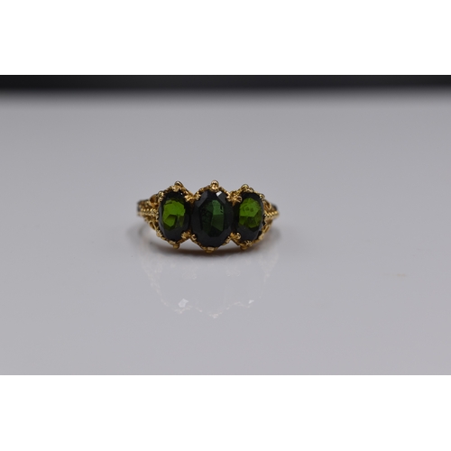 44A - A Hallmarked 9ct (375) Gold Trio Green Stoned Ring, Size P