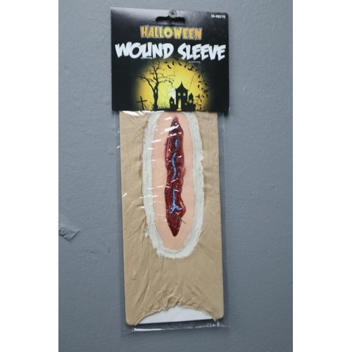 808 - A Large Selection of Halloween Items In Packaging To Include Wound Sleeve, Hair Bobbles, Drink Stirr... 