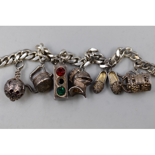 25 - Silver 925 Heavy Curblink Bracelet with Large Silver Charms to include Ballet Shoes, Medieval Helmet... 