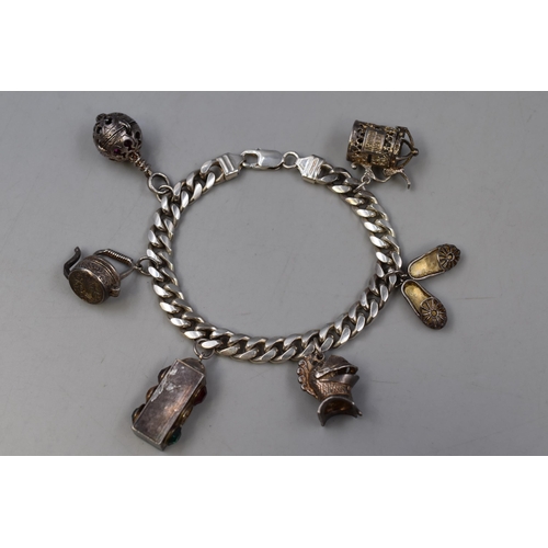 25 - Silver 925 Heavy Curblink Bracelet with Large Silver Charms to include Ballet Shoes, Medieval Helmet... 