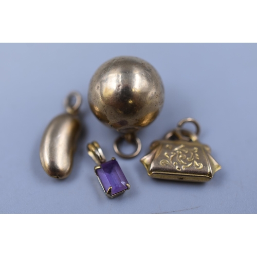 27 - A Selection of 9ct Gold Charms to Include Handbag, Kidney Bean, Bowling Ball and Gemstone Pendant