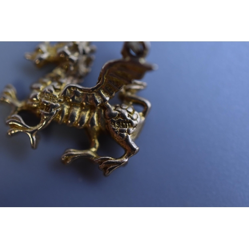 40 - Gold 375 Dragon Charm