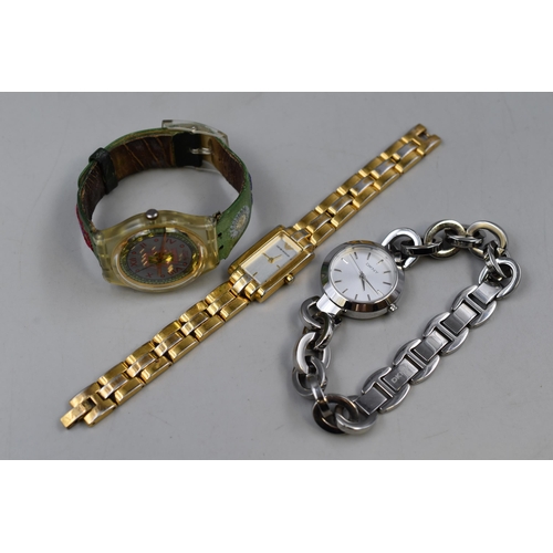 93 - Three Ladies Designer Watches To Include Swatch, DKNY, And Emporio Armani. Working