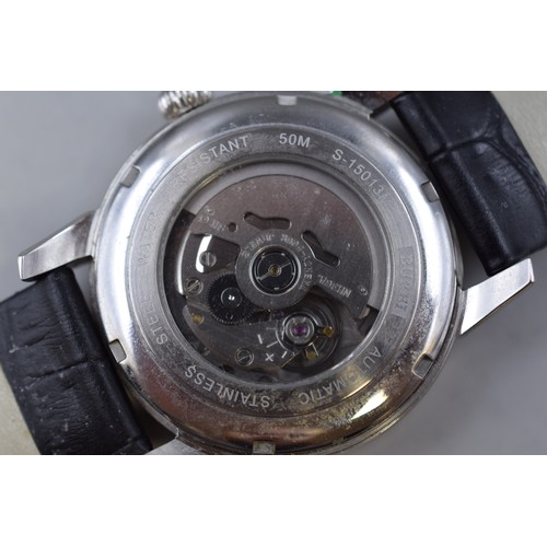 106 - A Burei Automatic Day/Date Watch, With Skeleton Back. Working