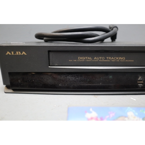 762 - Fifteen Original Disney VHS Videos With an Alba VHS Player (Works When Tested) Videos to Include The... 