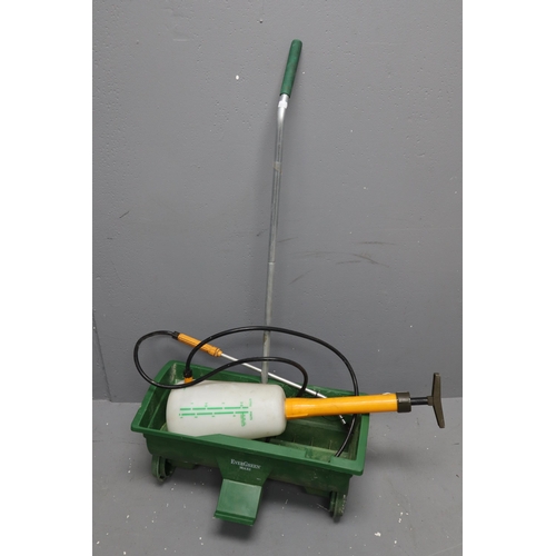 607 - Evergreen Maxi lawn seed spreader and a pump powered weed killer spray gun