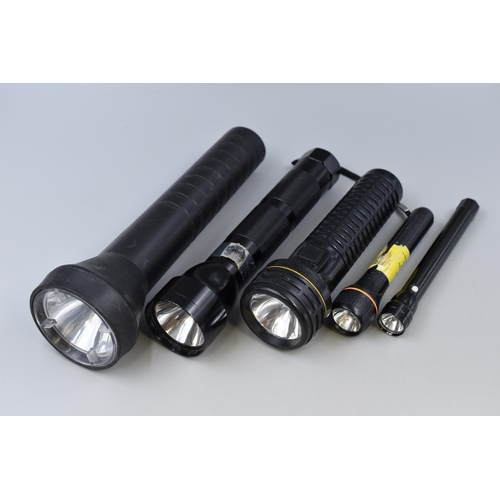 702 - Collection of 5 torches in various styles and sizes