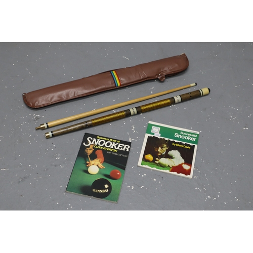 712 - A Two Piece Pool Cue In Bag, With Two Snooker Books