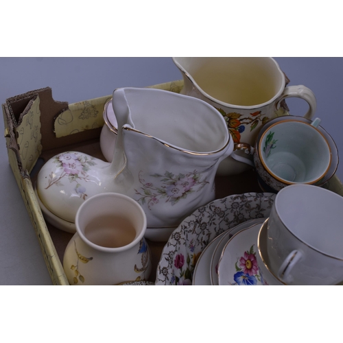 743 - A Selection of Ceramics To Include Boot Planter, Cup and Saucer Sets, Axe Vale Pottery Vase, And Mor... 