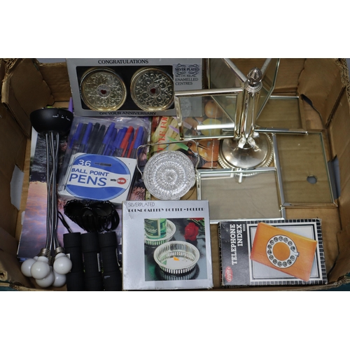 750 - Selection of silver plated items including, photo frames, bottle holder and glass coasters in a silv... 