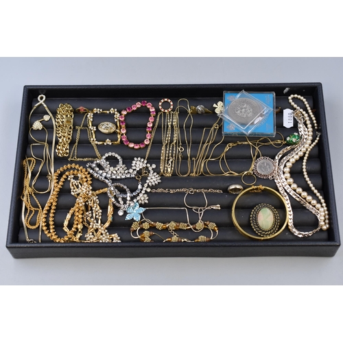 156 - A Selection of Vintage Designer Jewellery To Include Gold Tone Bangle, Various Necklace Chains, Sixp... 