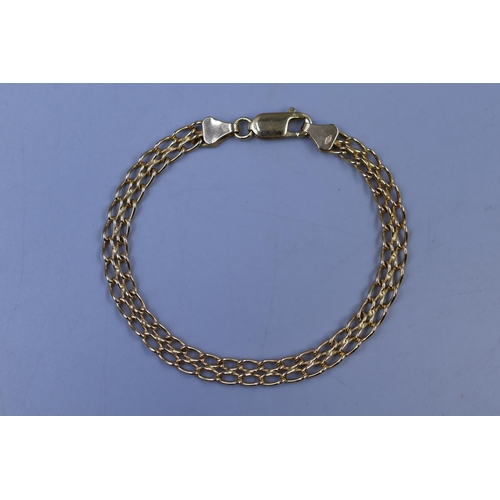 12 - A 9ct Gold (375) Double Curb Chain Bracelet (Length 18.5cm)