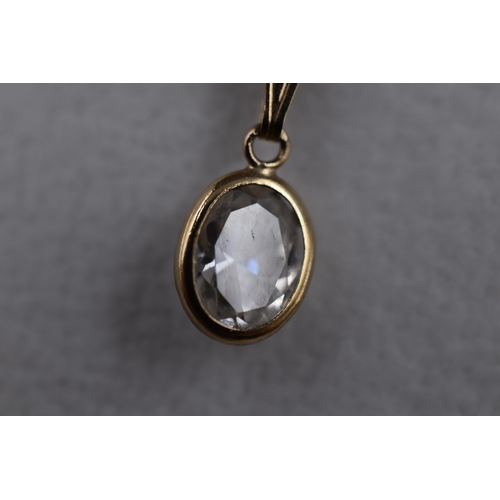 16 - A 9ct Gold (375) Clear Stoned Pendant Necklace