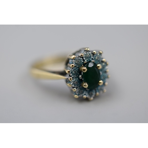 26 - Gold 375 0.05 Diamond and Green Stoned Ring