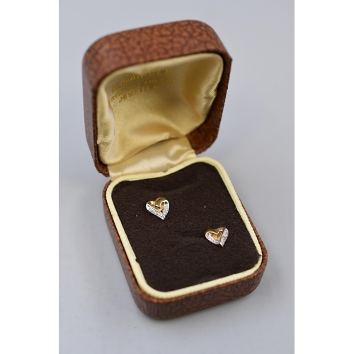 41 - A Pair of 9ct Gold Heart Stud Earrings