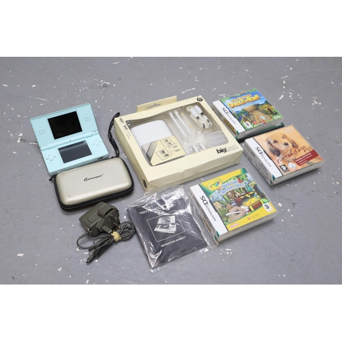 521 - Nintendo DS Lite Turquoise Colour With Charger and Six Games Also Comes With Big Ben Case, Pen, Head... 