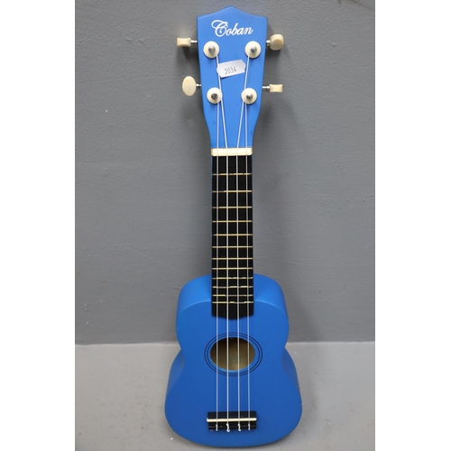 554 - Coban Guitars Blue Ukulele Complete in Coban Carry Case