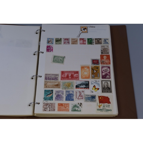 458 - Two Vintage Stamp Albums containing a Collection of Stamps from various Countries