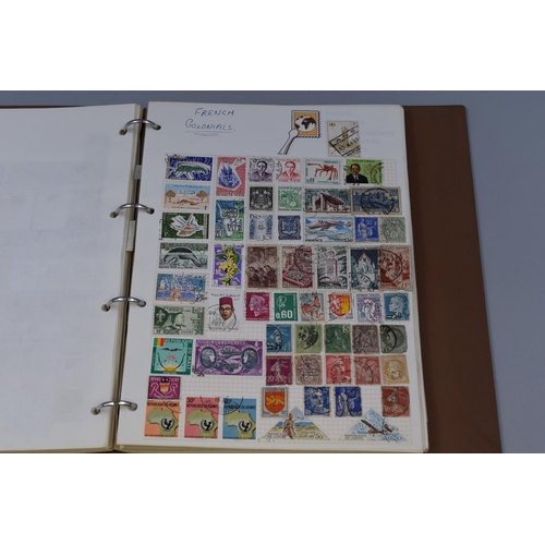 458 - Two Vintage Stamp Albums containing a Collection of Stamps from various Countries