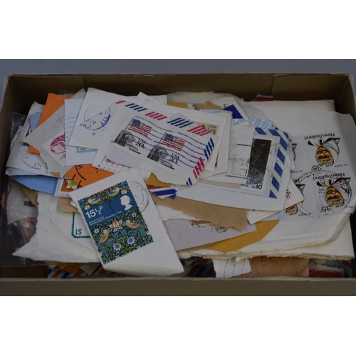 460 - A Selection of Unsorted Mounted Worldwide Stamps