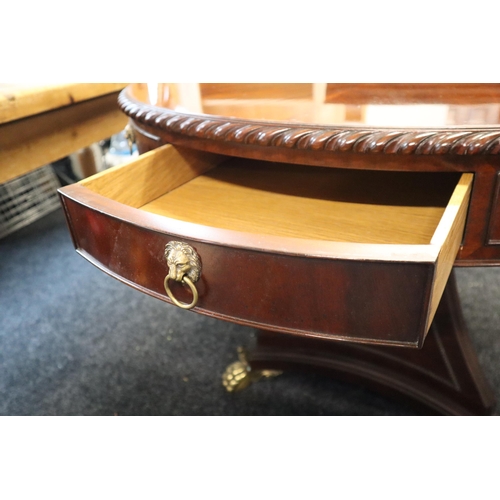 609 - Regency style, mahogany, circular drum table with four drawers and four faux drawers all with brass ... 