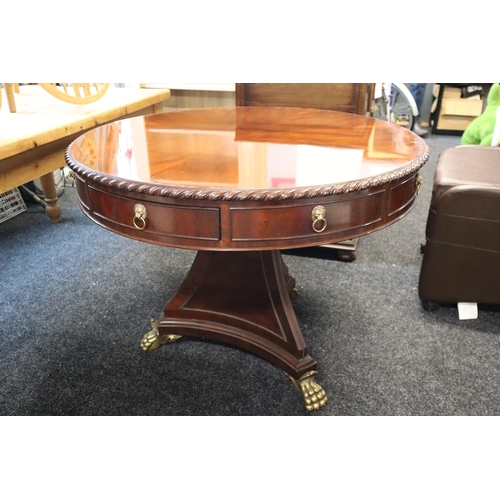 609 - Regency style, mahogany, circular drum table with four drawers and four faux drawers all with brass ... 