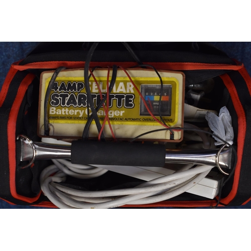 673 - Amtech tool box/bag with a few tools, extension leads, battery charger (untested) and more