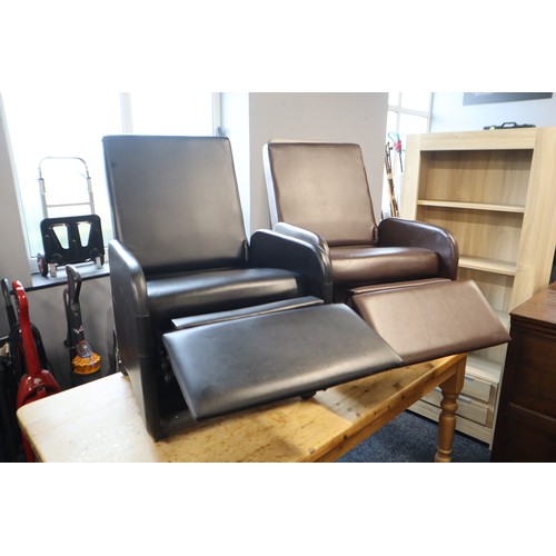 615 - Two arm chairs one brown one black reclining with foot rests, backs fold down to convert to a pouf, ... 