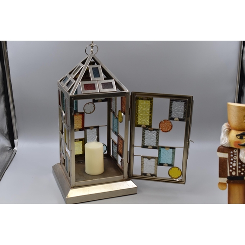 902 - Two Candle Holders including Nutcracker and Hanging Lantern (19