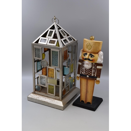 902 - Two Candle Holders including Nutcracker and Hanging Lantern (19