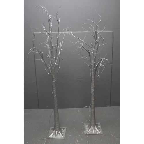 698 - Two Large Decorative Light-Up Silver Glitter Trees Both working when tested approx 56