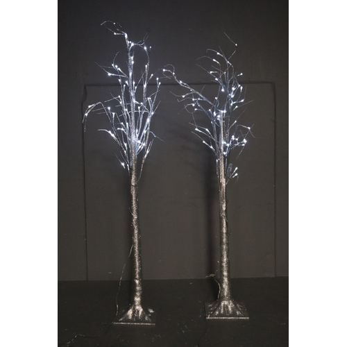 698 - Two Large Decorative Light-Up Silver Glitter Trees Both working when tested approx 56