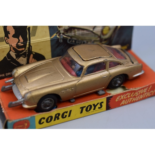 197 - Corgi No. 261 James Bond 007 Aston Martin DB5. Complete with spare figure, instructions and stickers... 