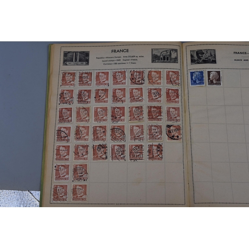 458 - Two Vintage Stamp Albums containing a Collection of Stamps from various Countries