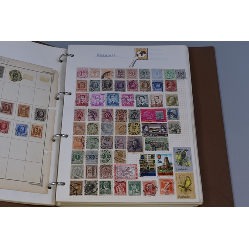 458 - Two Vintage Stamp Albums containing a Collection of Stamps from various Countries